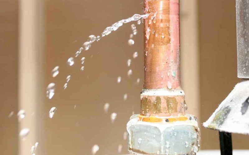 an image of a water heater with burst pipes.