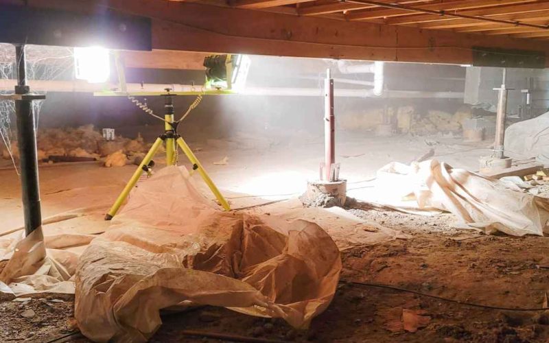 Mold damage inside of a crawl space.